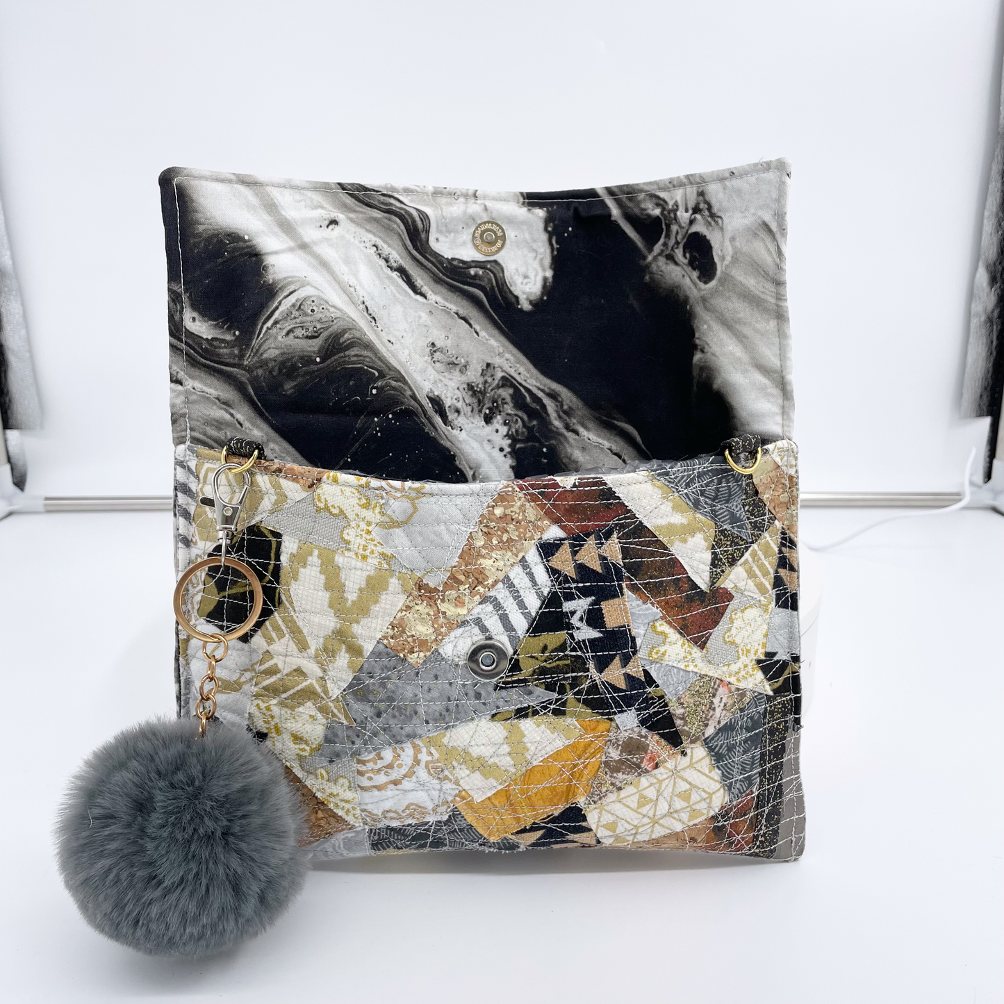 Small Gold and Silver Quilted Clutch